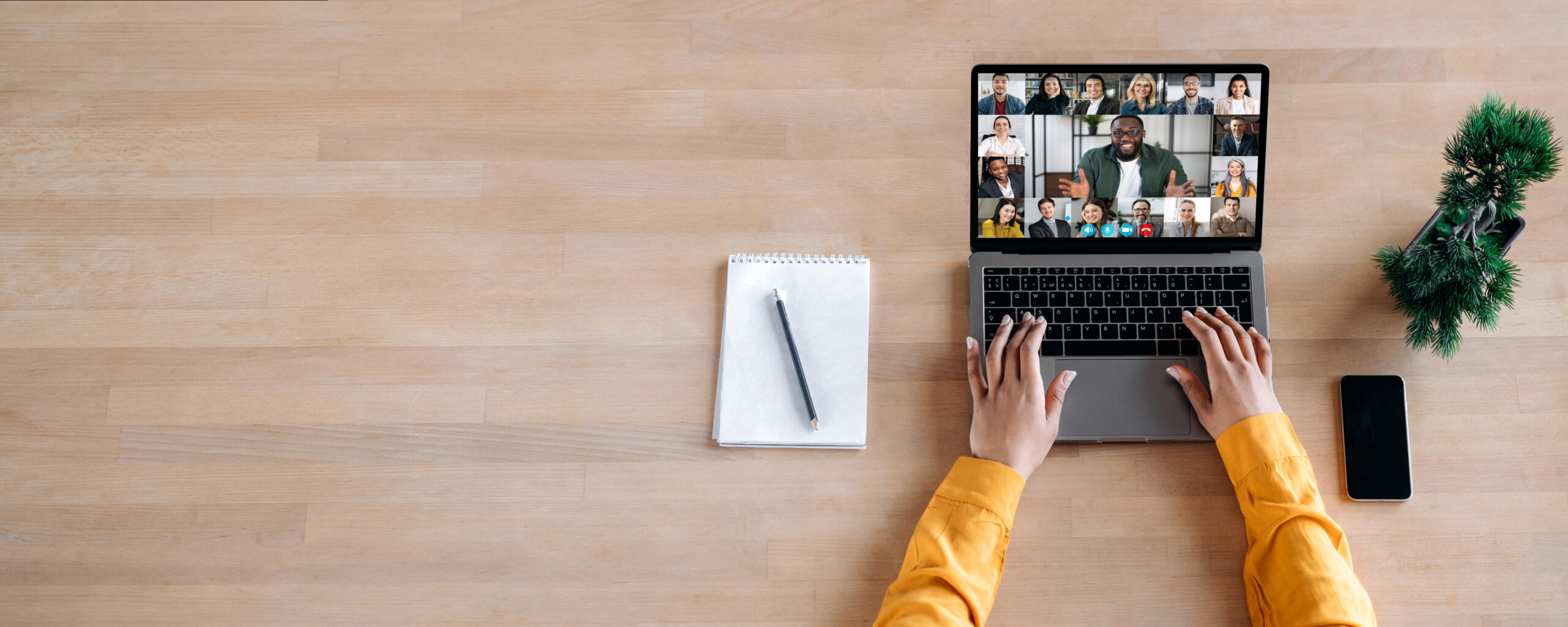 Online business briefing, virtual meeting. Panoramic photo of laptop screen with webcam shots of multi ethnic business partners communicates from home by a video conference, online webinar. Copy space